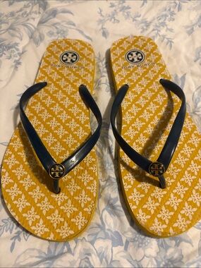Tory Burch Yellow Patterned Flip Flops with Navy Straps